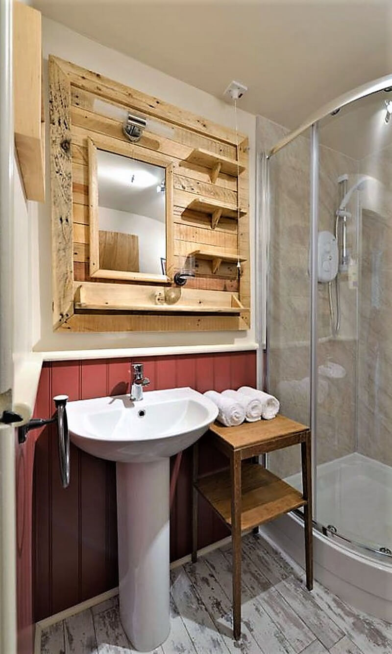 sink mirror ot of pallets with shelves